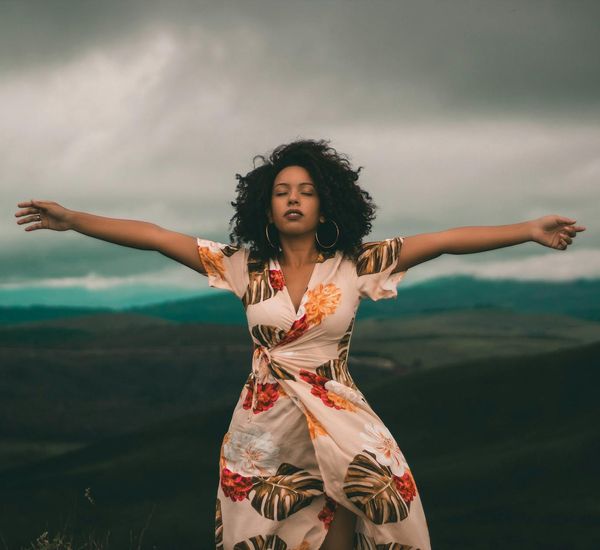 Person feeling serene and energetic outdoors.